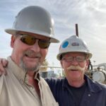 An image of Continental Controls Corporation's President Dave Fisher And Dave C together after a fuel control valve installation to lower emissions