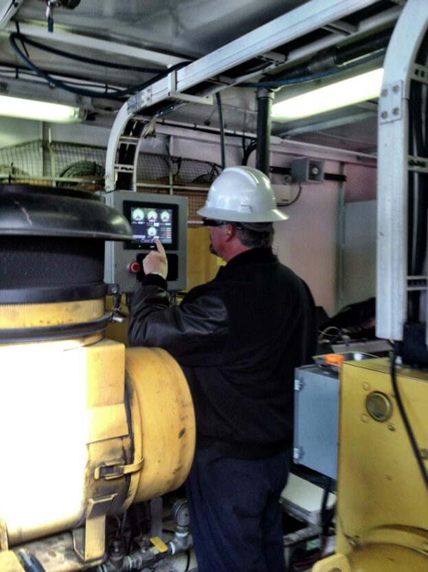 Continental Controls Corporation's Dave Fisher In Canada doing a training and installation of the Emissions control valve interface ECVI